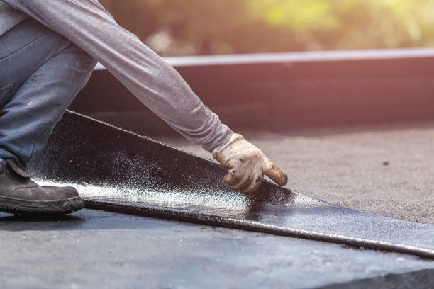 Professional Basement Waterproofing technician working in Sicklerville, NJ